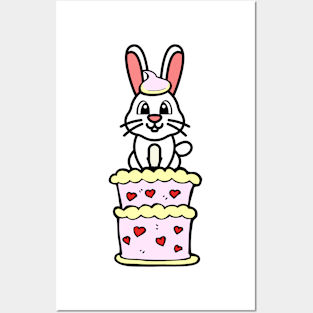 Funny rabbit jumping out of a cake Posters and Art